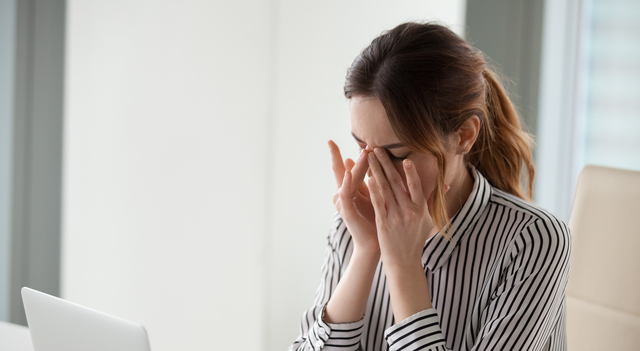 woman suffering from dry eyes